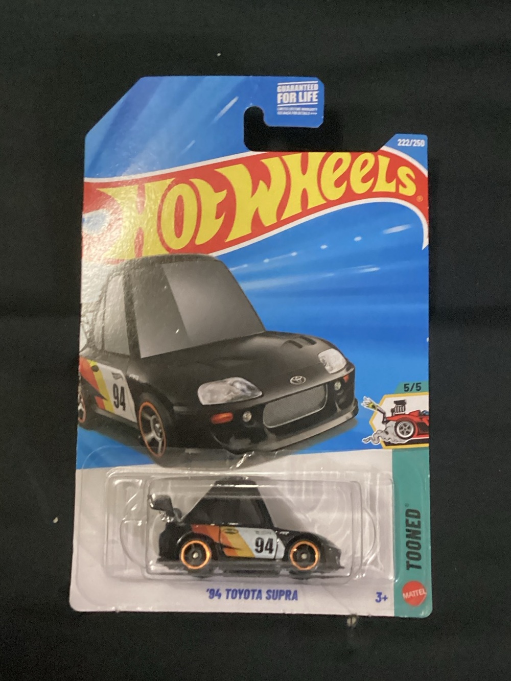 Hot Wheels '94 Toyota Supra Toy Car - Black with Orange Accents